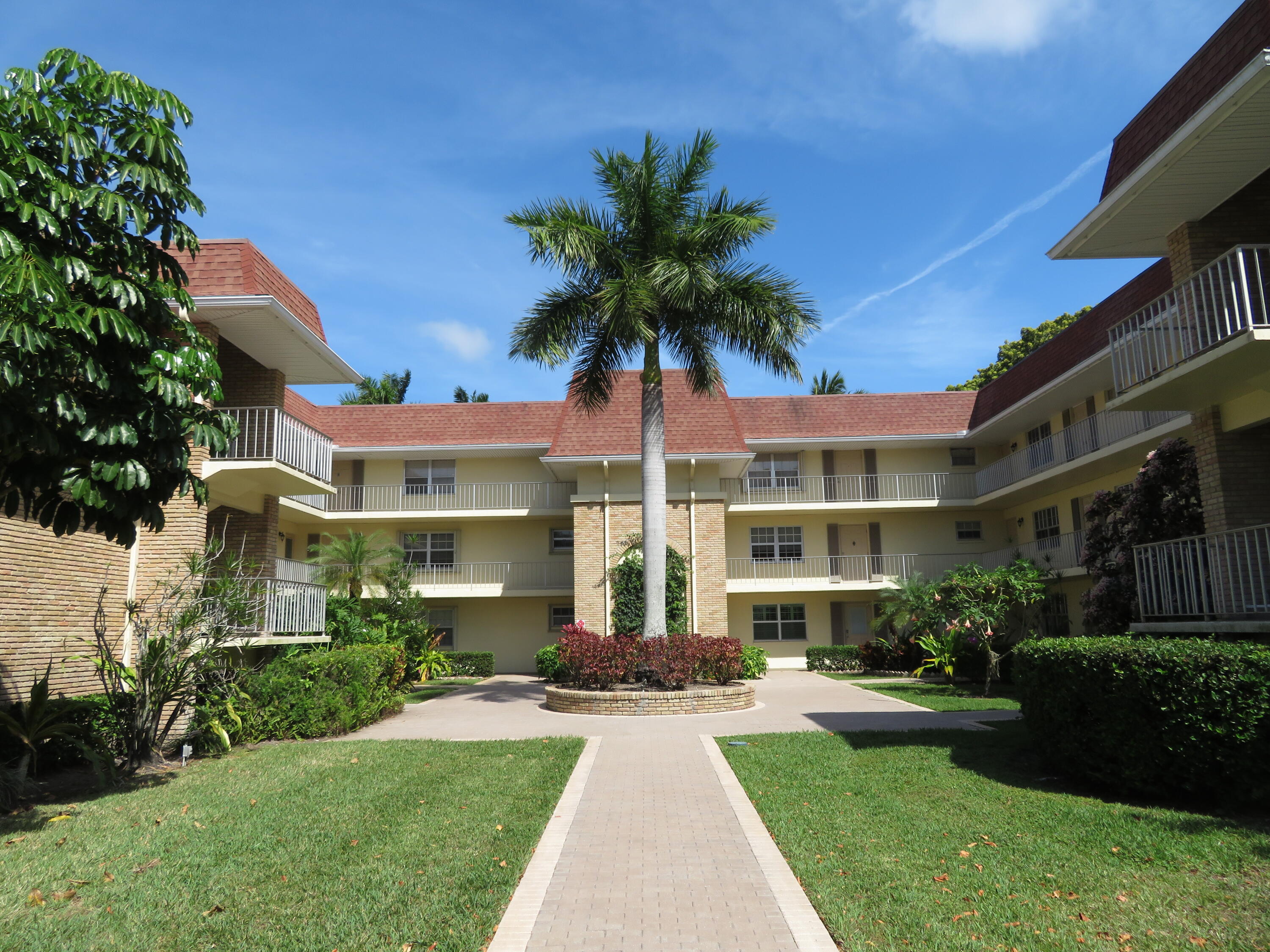 Welcome to 5580 Tamberlane #334, a charming corner unit in the heart of Palm Beach Gardens. This delightful one-bedroom, one-bathroom home boasts newer carpet in the living room and master bedroom, as well as beautiful new laminate flooring in the hallways, kitchen, and bathroom. The enclosed patio is the perfect spot to unwind with a morning coffee or an evening cocktail while enjoying the refreshing tropical breezes. From this unit, you'll experience one of the best westward views, offering stunning sunsets and a serene atmosphere. The kitchen features appliances that are just a couple of years old, and the unit includes an updated electrical panel for peace of mind. The vibrant community offers a clubhouse, library, pool, and a grill/patio area, providing plenty of opportunities for