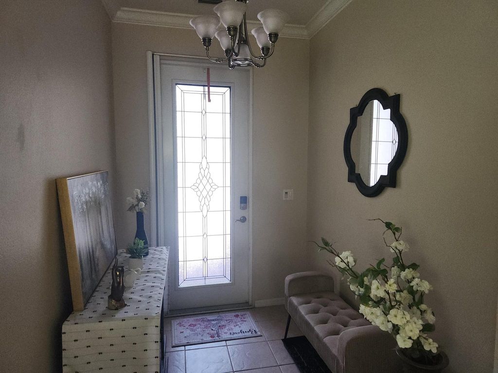 Photo of 309 SW Coconut Key Way, Port Saint Lucie, FL 34986 (MLS # R11113200)