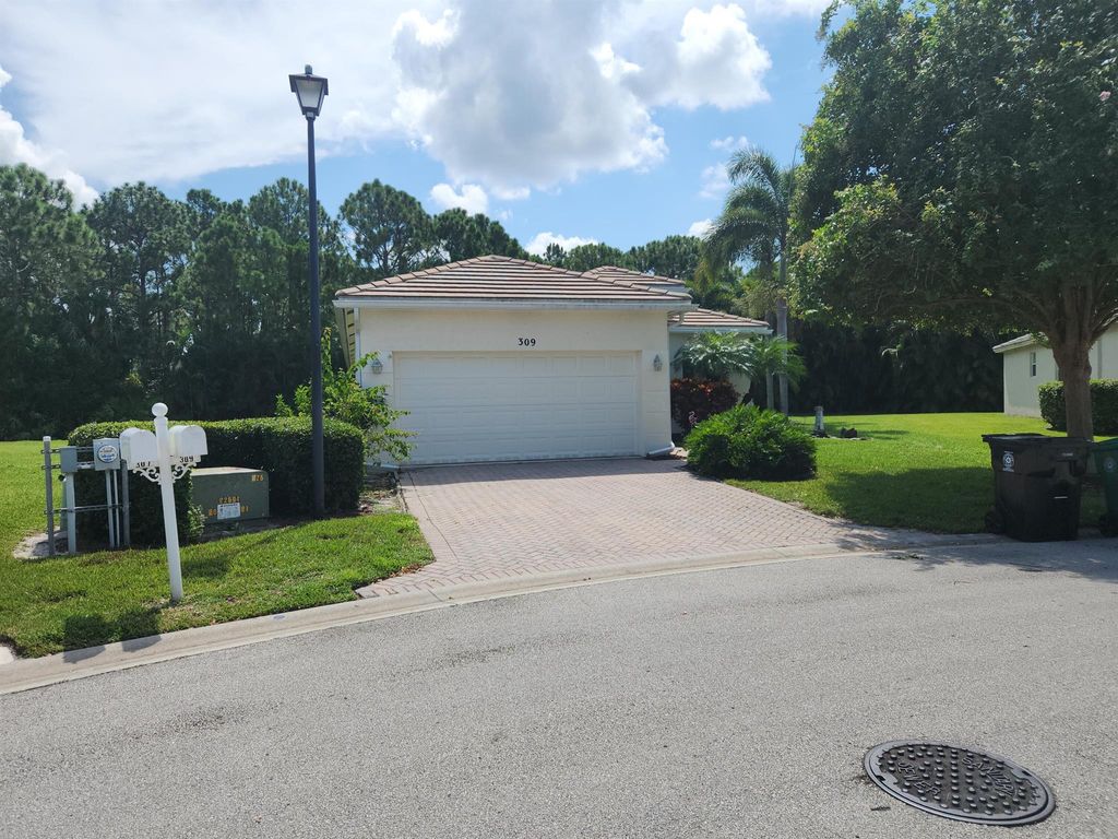Photo of 309 SW Coconut Key Way, Port Saint Lucie, FL 34986 (MLS # R11113200)