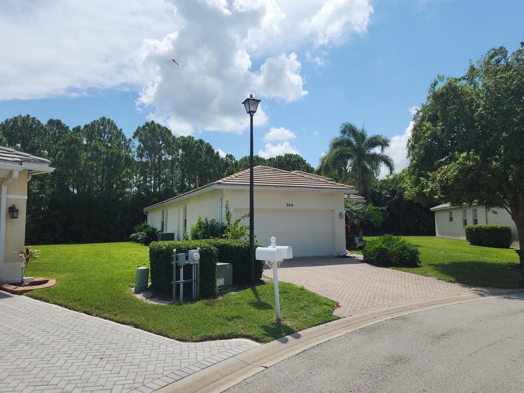 Photo of 309 SW Coconut Key Way, Port Saint Lucie, FL 34986 (MLS # R11113200)