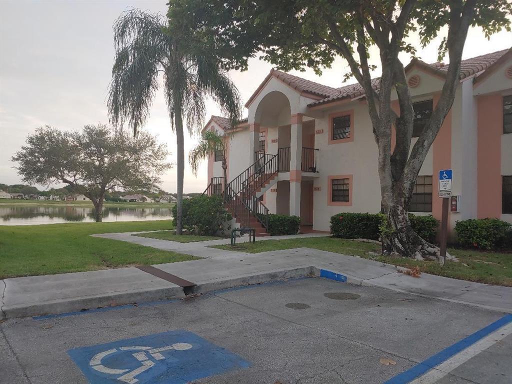 Nice 2/2 with partial lake view 2nd fl. Volume ceilings 2 fans newer appliances including a/c, water heater/washer/dryer. walk in closet in mstr. nice screened patio Tile floors thruout move in condition. Gated community in East Boca walk to FAU,restaurants 2 miles to beach all ages pets ok up to #40 no aggressive breeds water/cable in maint mgr on site pool tennis basketball walking paths a super place to live