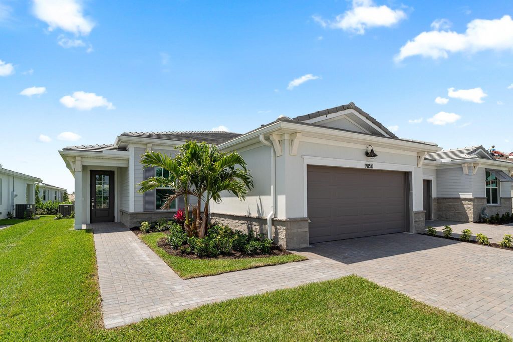 Photo of 9850 SW Veronese Drive, Port Saint Lucie, FL 34987 (MLS # R11015875)