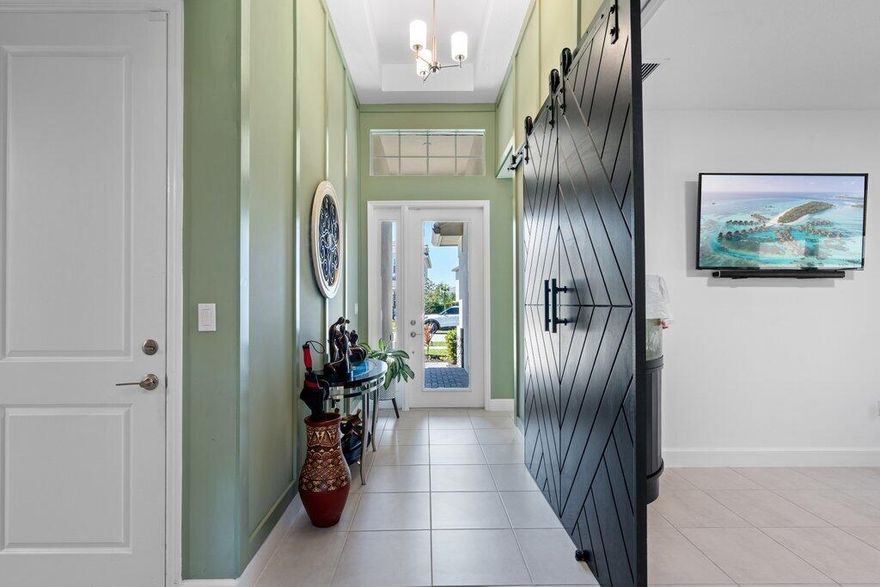 Nestled on a quiet cut-de-sac in one of the most highly sought-after neighborhoods, this beautifully appointed 4-bedroom,3 full bath residence offers the perfect blend of comfort, style,and sophistication. Designed with both everyday living and effortless entertaining in mind, the home features a spacious and thoughtfully designed layout with generously sized bedrooms, elegant living spaces, and abundant natural light throughout.The primary suite provides a private retreat, while the additional bedrooms and full bath offer flexibility for guests, family, or a home office.This exceptional property combines privacy with proximity to top-rated amenities, including 3 resort style pools, cabanas, hot tub, sports courts, zip-line,dog park, playgrounds, weekly food trucks and a 5 acre working     farm+a new A+rated elementary school
