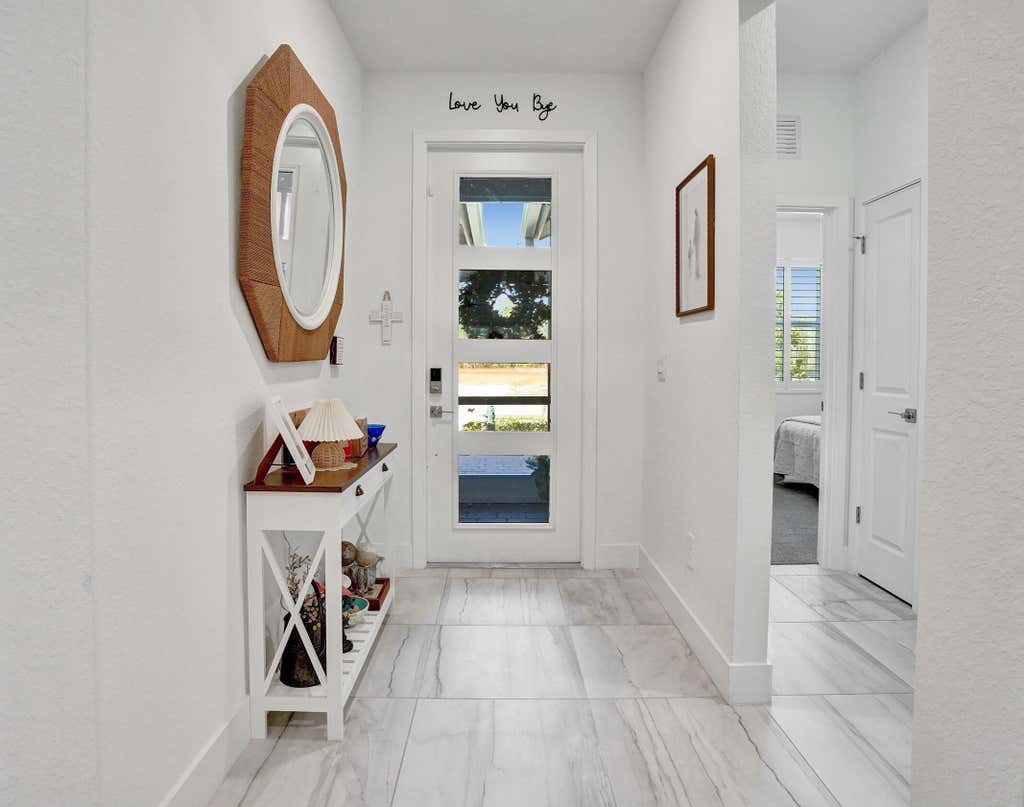 Photo of 6651 SE Park Trace Drive, Stuart, FL 34997 (MLS # B26059380)