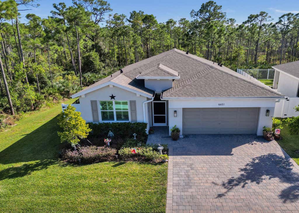 Photo of 6651 SE Park Trace Drive, Stuart, FL 34997 (MLS # B26059380)