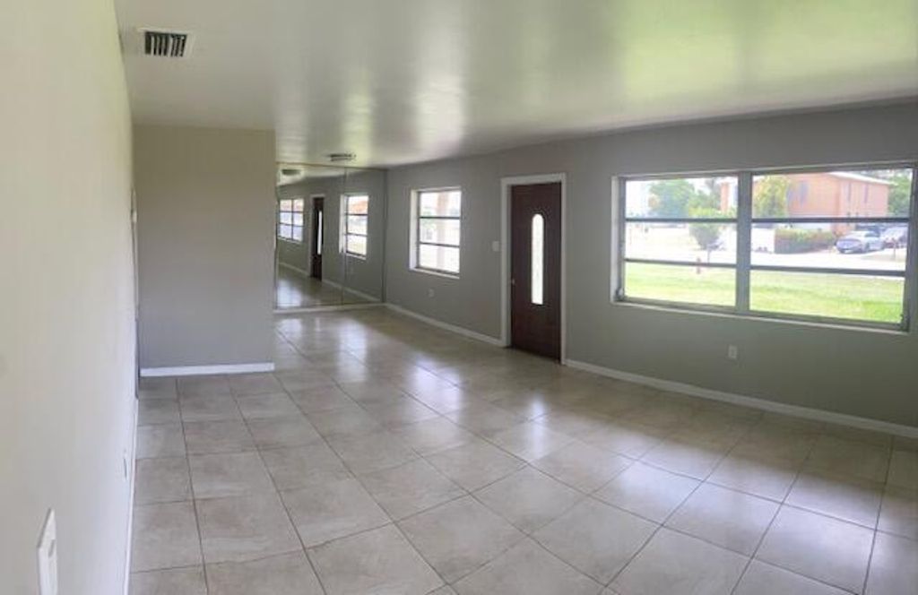 Photo of 604 SW 13th Street, Belle Glade, FL 33430 (MLS # R10990423)