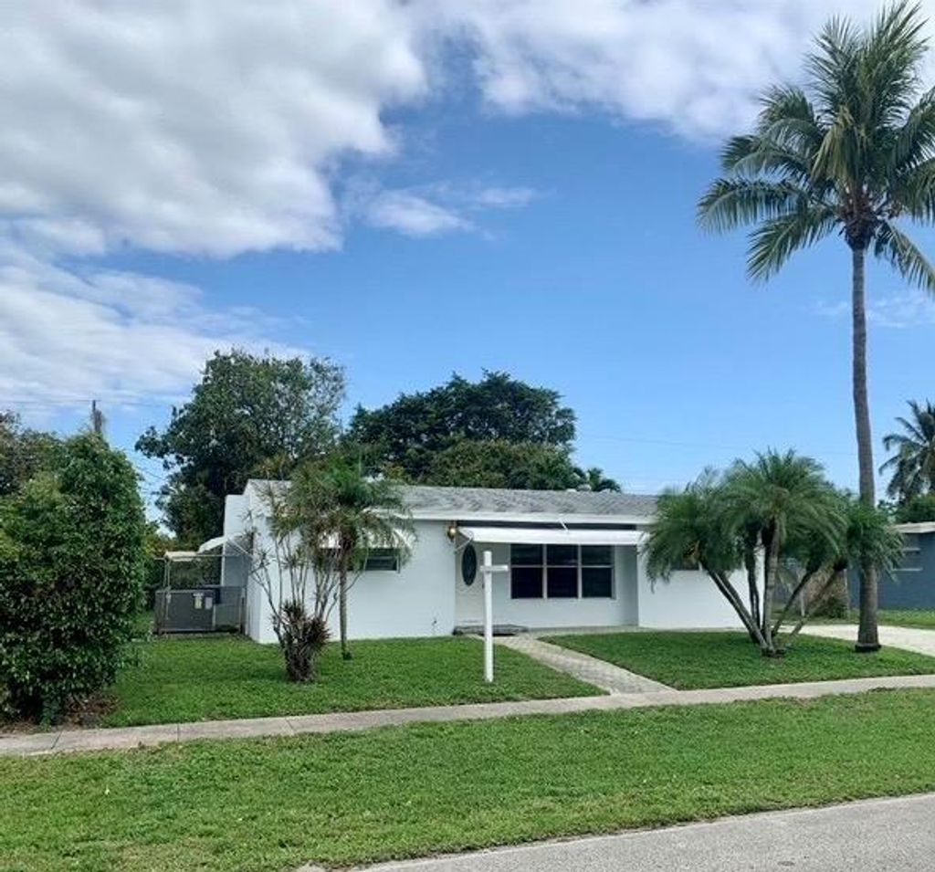 Photo of 435 Cheyenne Drive, Lake Worth, FL 33462 (MLS # R10712285)