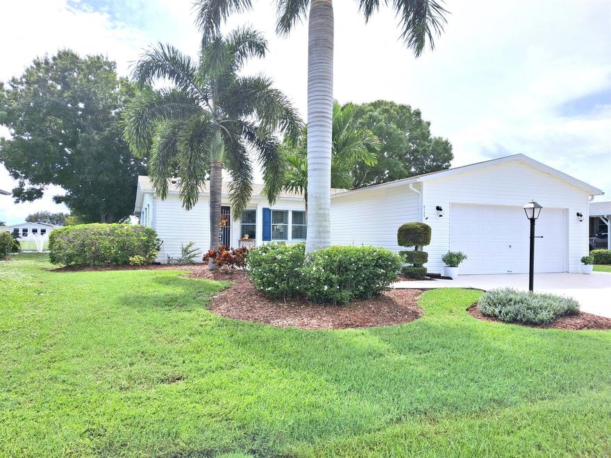 Immaculate water view garage home with two beds & two baths. 2021 Roof, LVP flooring, & kitchen remodel with quartz countertops. Refrigerator 2019, 2025 new dishwasher, WH, and disposal. New AC approx. 2020. Extra large lanai to soak up the view of the water. Partially remodeled baths with porcelain tile in the primary bath. This home won't disappoint! Shows just like the photos. HOA includes internet, trash, and cable plus access to all the amenities. Move right in and enjoy all that Savanna Club has to offer. 18-hole golf course, an on-site restaurant, on-site theater, 3 clubhouses, 3 exercise centers, pickleball, tennis, bocce, shuffle board, corn hole, and so much more. Numerous clubs and events are available to keep you as active. Hospital, doctors & beaches are all within minutes.