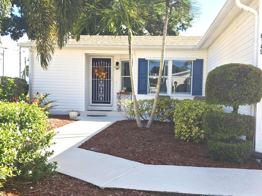 Photo of 8145 Meadowlark Lane, Port Saint Lucie, FL 34952 (MLS # R11132101)
