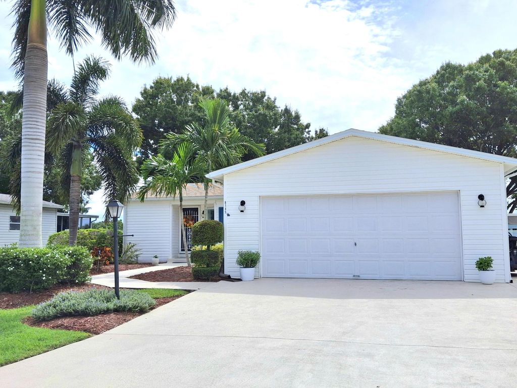 Photo of 8145 Meadowlark Lane, Port Saint Lucie, FL 34952 (MLS # R11132101)