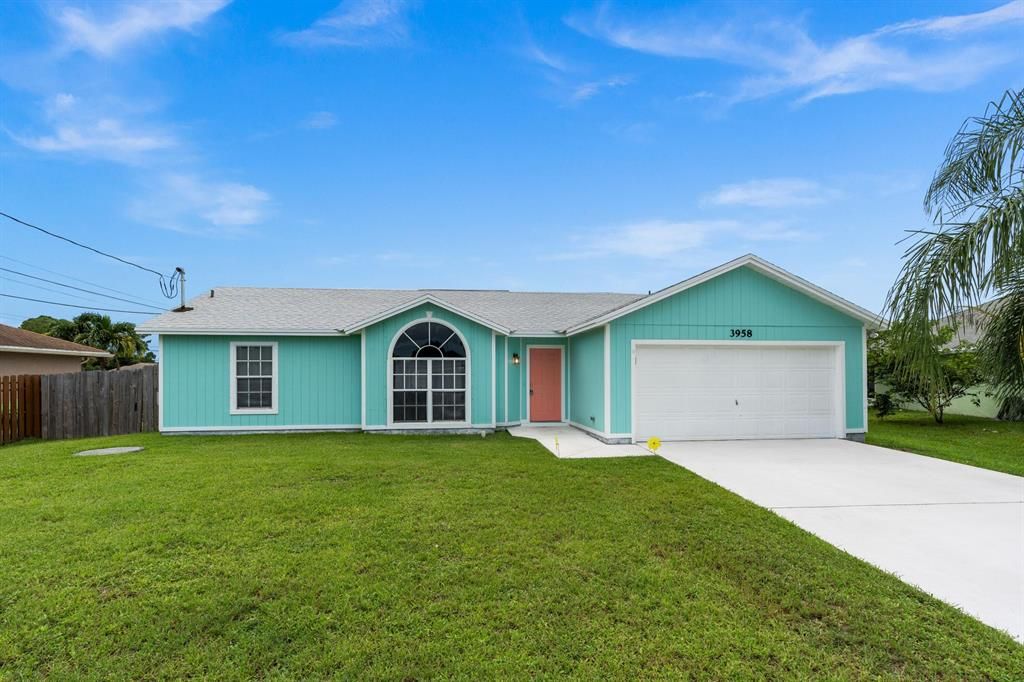 Photo of 3958 SW Halcomb Street, Port Saint Lucie, FL 34953 (MLS # R10738041)