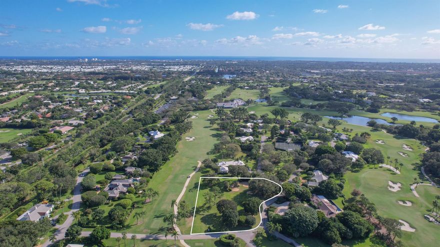 Imagine a perfect setting to build your dream home. We present a sprawling 1.26-acre lot, gracefully adorned with majestic oak trees, that offers an impressive 220 feet lining the 9th fairway of the esteemed Country Club of Florida. Current FAR allows for a 7667+/- SF home within set-backs. Nestled within the secure and gated Village of Golf, this location promises an ambiance of tranquility and elegance. You'll be mere minutes away from the pristine white sands and shimmering waters of the Atlantic Ocean. Embrace the lively atmosphere of Delray Beach's downtown, brimming with art, shopping, and exquisite dining choices. Strategically positioned between Palm Beach and Boca Raton, this homesite provides the convenience of proximity to both private and international airports