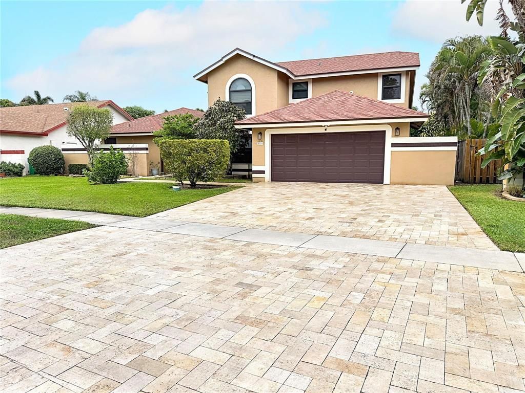 Photo of 8725 SW 56th Place, Cooper City, FL 33328 (MLS # B26008120)