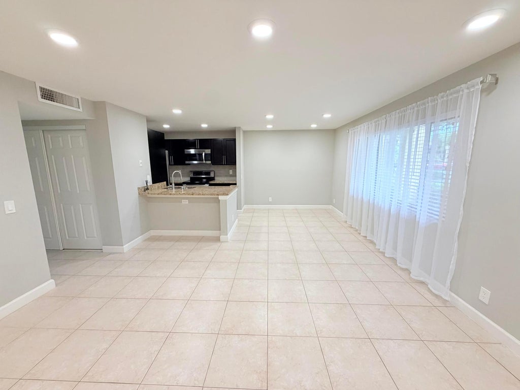 Photo of 907 MEADOWS Circle, Boynton Beach, FL 33436 (MLS # B26083193)