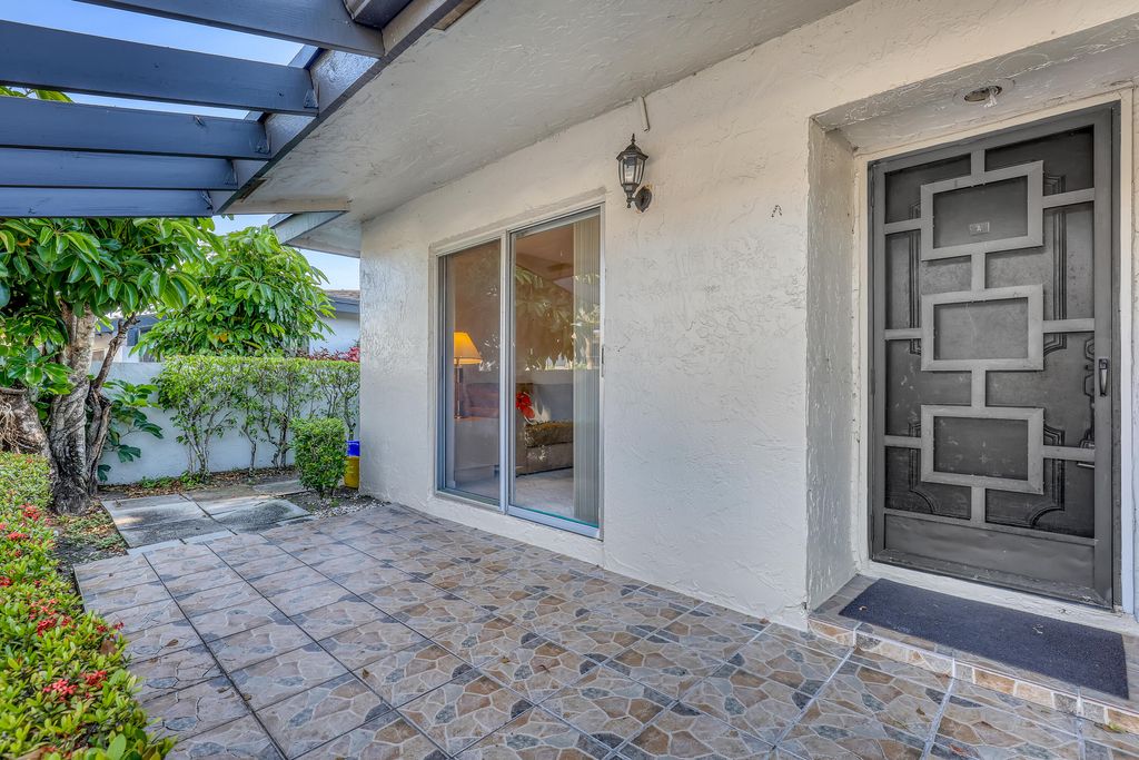 Photo of 13841 Royal Palm Court #A, Delray Beach, FL 33484 (MLS # B26009056)