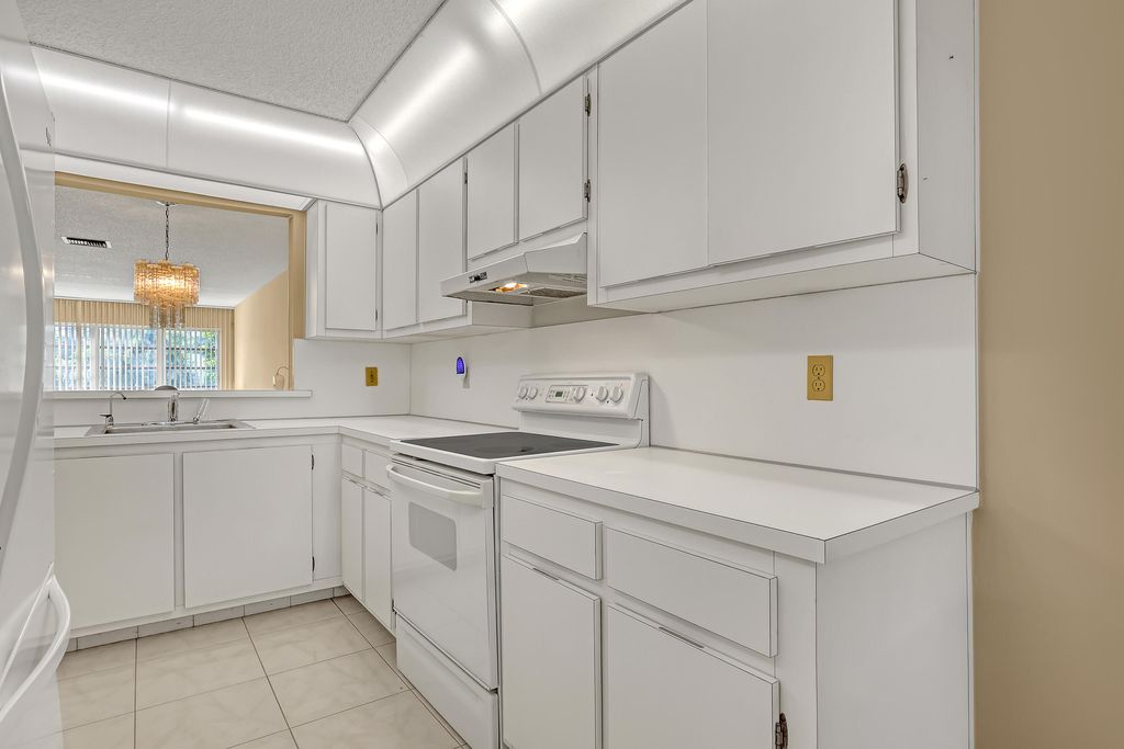 Photo of 13841 Royal Palm Court #A, Delray Beach, FL 33484 (MLS # B26009056)