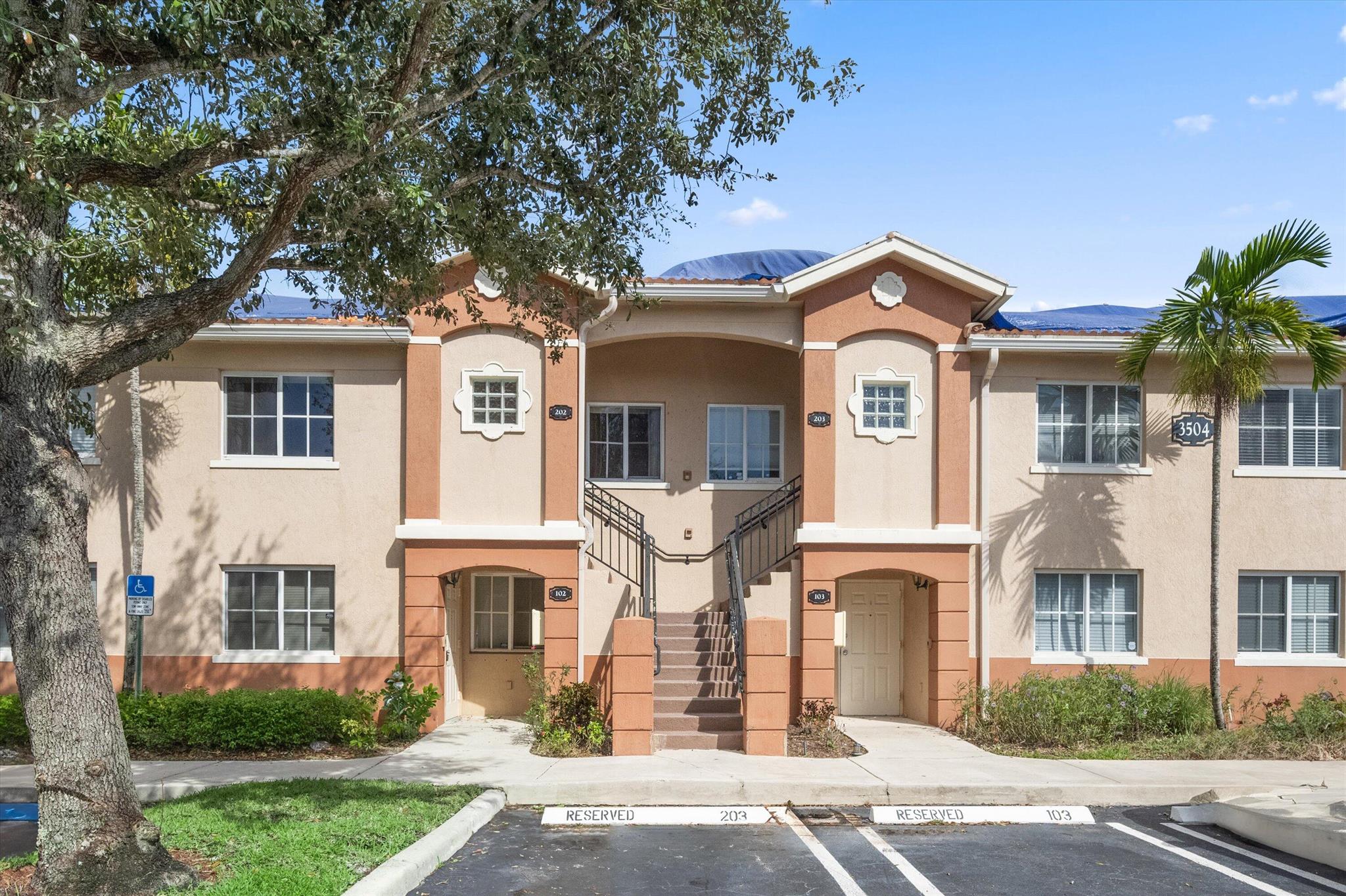 This 2-bed, 2-bath top-floor condo, nestled in a gated community, offers a practical and inviting living space. Embrace the convenience of a new refrigerator, accordion shutters, ceramic tile, and wood floors. The vaulted ceilings contribute to the spacious atmosphere. Appreciate the functionality of walk-in closets. Residents can unwind in the clubhouse or community pool, adding a sense of community. With proximity to shopping and dining, this condo effortlessly combines comfort and convenience. Your new haven awaits--make it yours today! All information deemed accurate, must be confirmed by tenant or by tenant's agent.