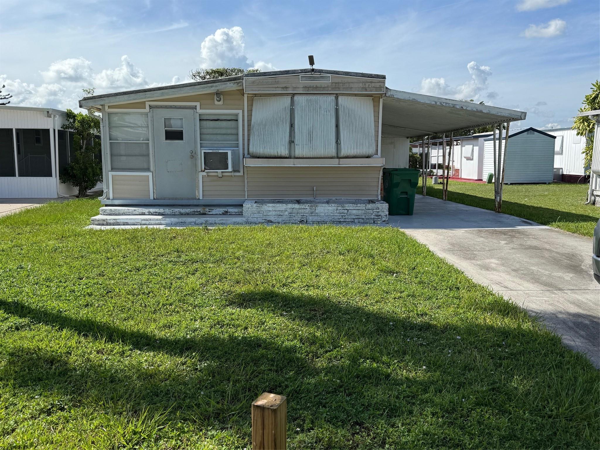 Priced to sell!! 1/1 in Park City Estates. This community features 3 clubhouses, 3 pools, 14 shuffleboard courts, Billard room and much more. This is a great site to put a new home or could put some work into the existing one.