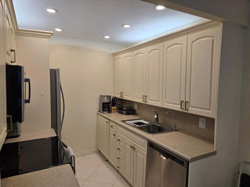 Photo of 2031 Exeter Dr, Boca Raton, FL 33434 (MLS # B26050611)