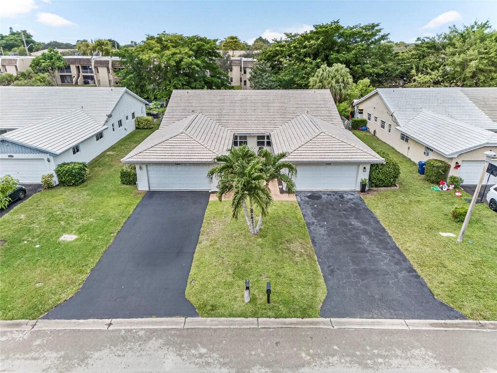 Photo of 3002 NW 103rd Lane, Coral Springs, FL 33065 (MLS # F10544031)