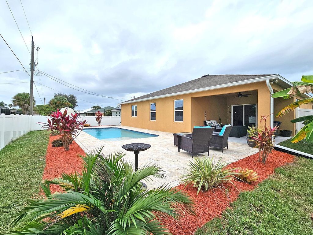 Photo of 934 SW Worcester Lane, Port Saint Lucie, FL 34953 (MLS # R11155150)