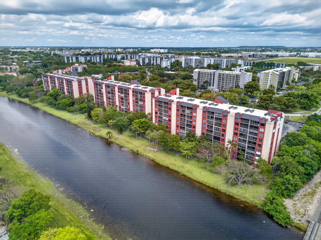 Photo of 2200 S Cypress Bend Drive #101, Pompano Beach, FL 33069 (MLS # B26023222)