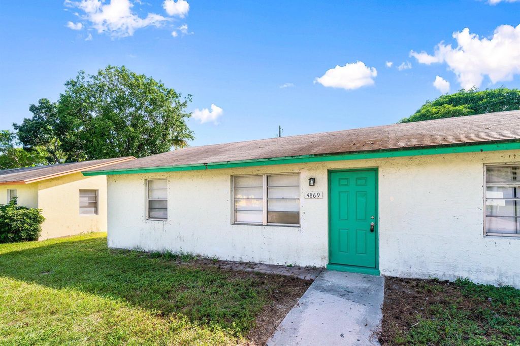 Photo of 4869 Gulfstream Road, Lake Worth, FL 33461 (MLS # R11139444)