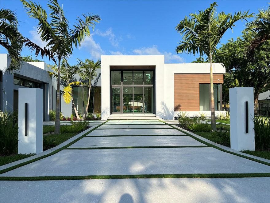 Luxurious New construction Masterpiece. This house's unique design and modern finishes are sure to impress! Ravishingly sophisticated Design, expansive open floor plan, seamless Indoor Outdoor living spaces perfect for entertaining, 16 foot ceilings, natural light filters through large floor to ceiling impact glass, Chef's Kitchen with Luxury appliances and floor to ceiling custom wood cabinetry, professional grade range, built-in Coffee maker, oversized Quartzite Natural stone waterfall island, Butlers Pantry. Master Suite with Study/ Workout area overlooking the pool, spa like Master bath with a trough sink, generous his and hers closets, dream Laundry/ Mud room with floor to ceiling built ins, Pet Wash Station, large pool with sun deck, lush landscape.
Best value in new construction!