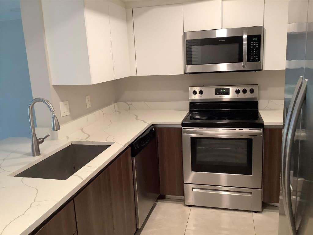Photo of 65 DEER CREEK Road #H102, Deerfield Beach, FL 33442 (MLS # B26060944)