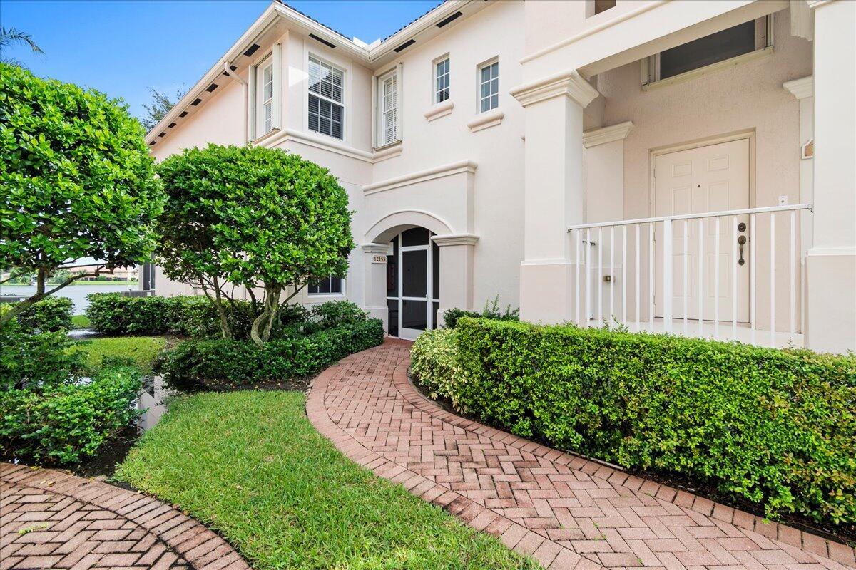 Welcome to Mayfair, an active adult oasis in Wellington. Discover luxury, comfort, and endless possibilities in this vibrant 55+ community. Nestled in scenic Palm Beach County, Mayfair offers an array of amenities to fulfill your retirement dreams.Don't miss this rare one-story unit with a serene Lake Wellington view from the screened and covered patio. This meticulously maintained unit boasts extras like added storage, crown molding, accordion shutters, and a soon-to-be-installed new roof. Plus, there's no carpet!Experience resort-style living with a clubhouse, fitness center, & heated pool. Enjoy a prime location just steps from the Wellington Amphitheater and community center. The Winter Equestrian Festival is a mere 9-minute drive, and the convenience of PBI airport is close by