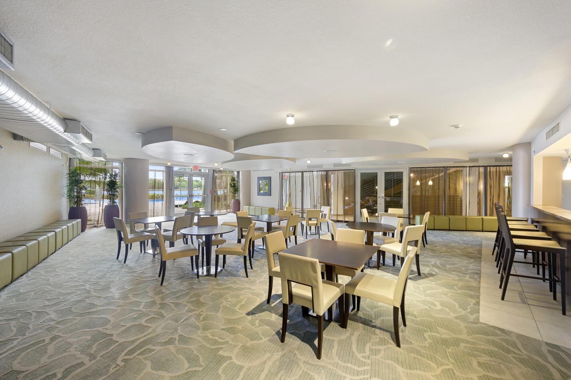 TAO SAWGRASS CONDOMINIUM - Residential