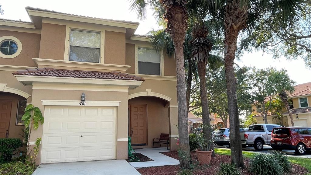 Perfect place to call home! This beautiful townhome has 3 bedrooms, 2 1/2 baths and is on the corner with no neighbors behind you. It is an end unit so, plenty of natural light! There is a 1 car garage, driveway and open parking spaces right outside the unit. Washer/dryer are upstairs. The bedrooms are large enough to fit double or queen beds, with room for a king bed in the master. Master has 2 closets. The master bath has double sinks. There are ceiling fans in all of the rooms to help keep you cool and blinds on all the windows for privacy. Seminole Estates, has pools, basketball, playgrounds and is gated for security. There is a water park across the street. Close to the airport, beaches, dining and shopping!! Perfect family friendly community in a great location!!