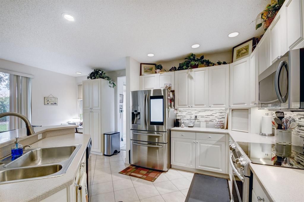 Photo of 7300 Copperfield Circle Cir, Lake Worth Beach, FL 33467 (MLS # R10809636)