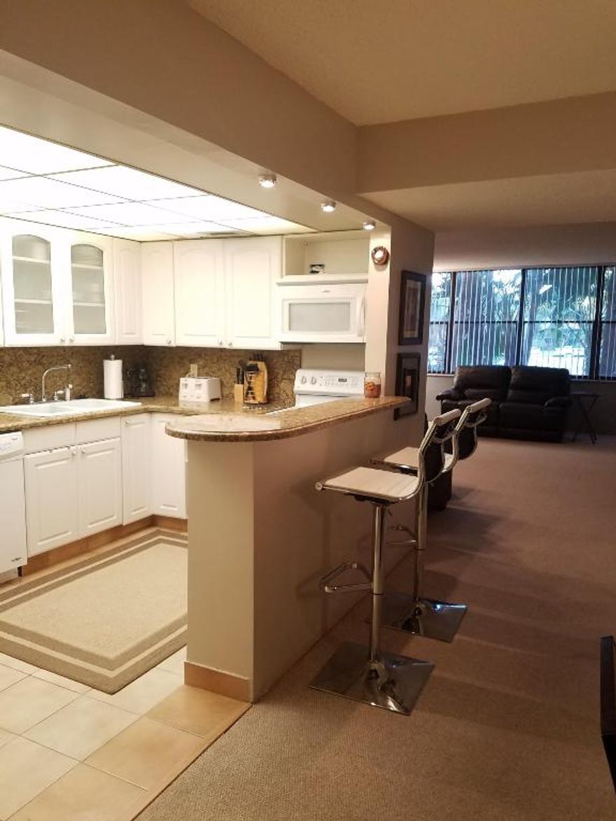 Large renovated 1 bedroom w two full baths.  Super clean, light and bright.  Has actual laundry room with washer/dryer inside apartment and closed in balcony which can serve as convertible second bedroom.   Full amenities including beautiful Pool on the Golf Course!  Great neighborhood! Great schools and Bonaventure spa and resort around the corner!