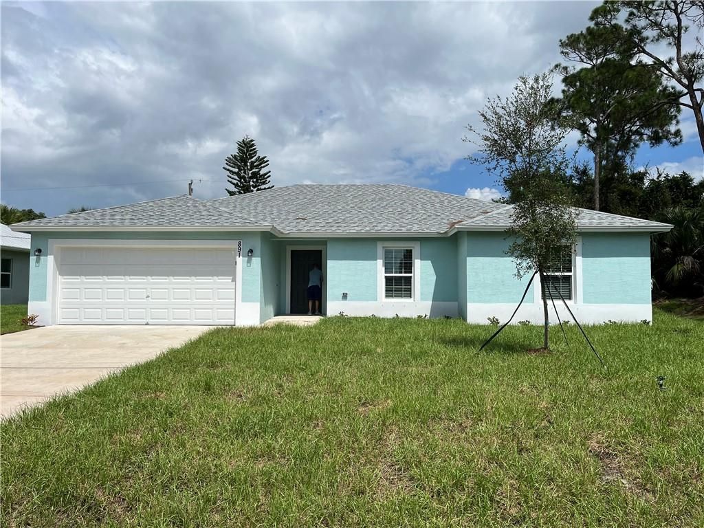 Photo of 891 SW AVIATION AVE Ave #891, Port Saint Lucie, FL 34986 (MLS # F10350392)
