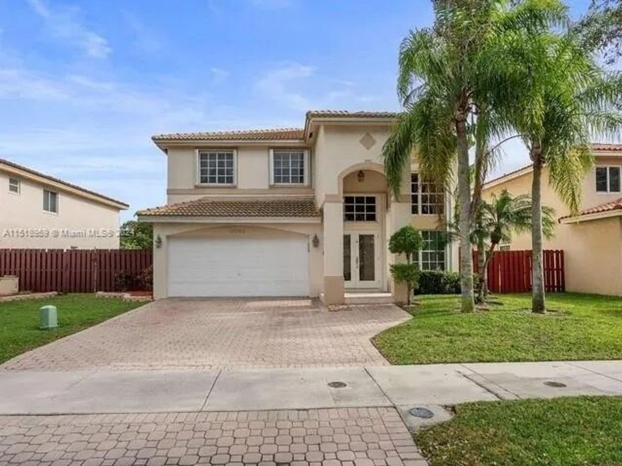 Beautifully maintained two-story waterfront home located in the highly desirable community of Davie. This spacious residence features 4 bedrooms, 3 bathrooms, and approximately 2,669 square feet of living space with elegant marble and wood flooring throughout. The home offers upgraded bathrooms, granite accents, abundant natural light, and an open layout designed for comfortable living and entertaining. Situated on a serene lakefront lot, the property provides peaceful water views and a tranquil atmosphere while still being conveniently close to top-rated schools, shopping, dining, and major highways. Additional highlights include a 2-car garage, hurricane shutters, and a prime location in one of Davie's most sought-after neighborhoods. To be able to show the property please call or text the listing agent. 24 hour notice required.