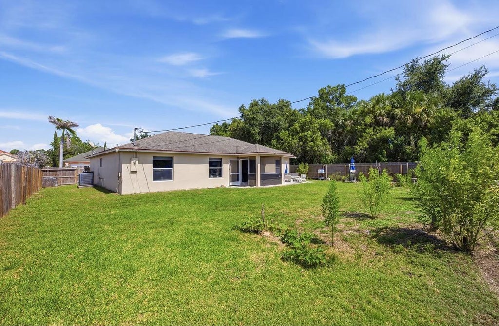 Photo of 2673 SW ABELARD ST, Port Saint Lucie, FL 34953 (MLS # B26081053)