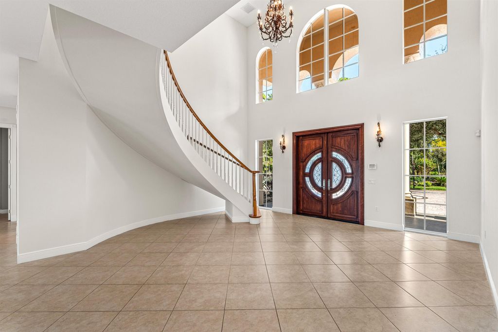 Photo of 6071 NW 69th Way, Parkland, FL 33067 (MLS # R11133936)