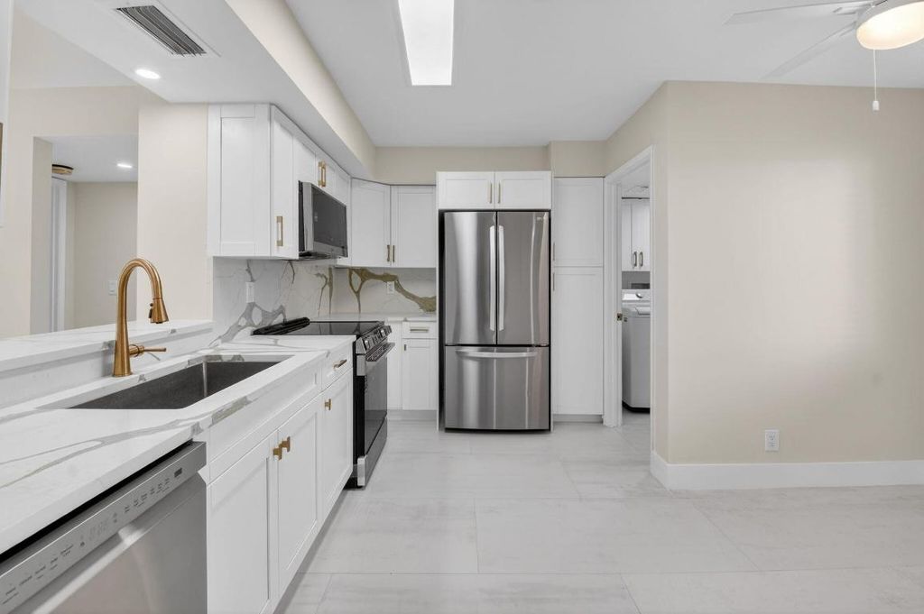 Photo of 7360 S Oriole Boulevard #102, Delray Beach, FL 33446 (MLS # R11155980)