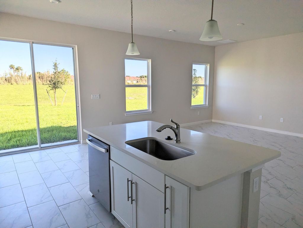 Photo of 10597 SW Vasari Way, Port Saint Lucie, FL 34987 (MLS # B26003936)