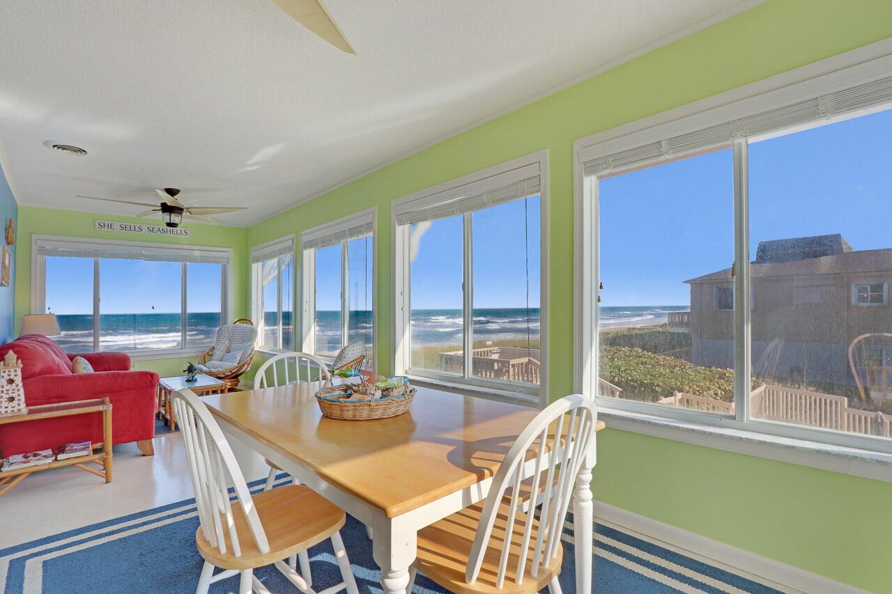 AVAILABLE DECEMBER 2025 AND APRIL 2026! Most desirable END unit in Little Ocean Place with amazing ocean views on the second floor! A few steps to the beach!  Lovely 2 bedroom condo with beachy decor, comfortable furniture, washer/dryer, community pool. All utilities included. Just adorable! One parking space only, no trucks and no pets. Don't miss out on this beauty!