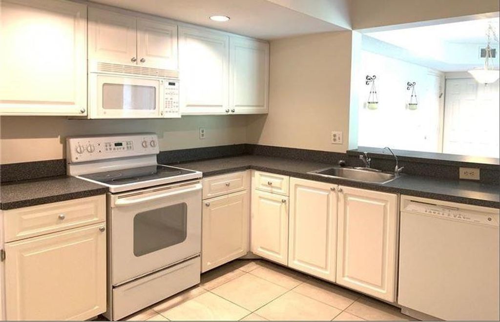 Photo of 5621 Riverside Drive #102, Coral Springs, FL 33067 (MLS # F10482362)