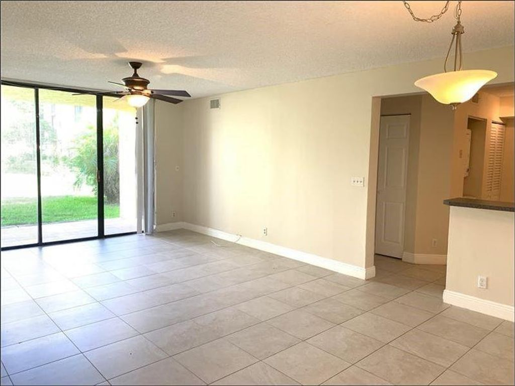 Photo of 5621 Riverside Drive #102, Coral Springs, FL 33067 (MLS # F10482362)