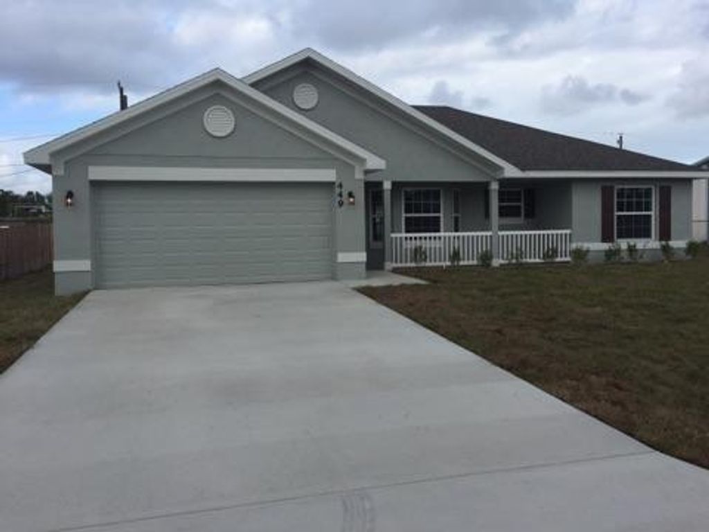 Photo of 725 SE Lighthouse Avenue, Port Saint Lucie, FL 34983 (MLS # R10722935)