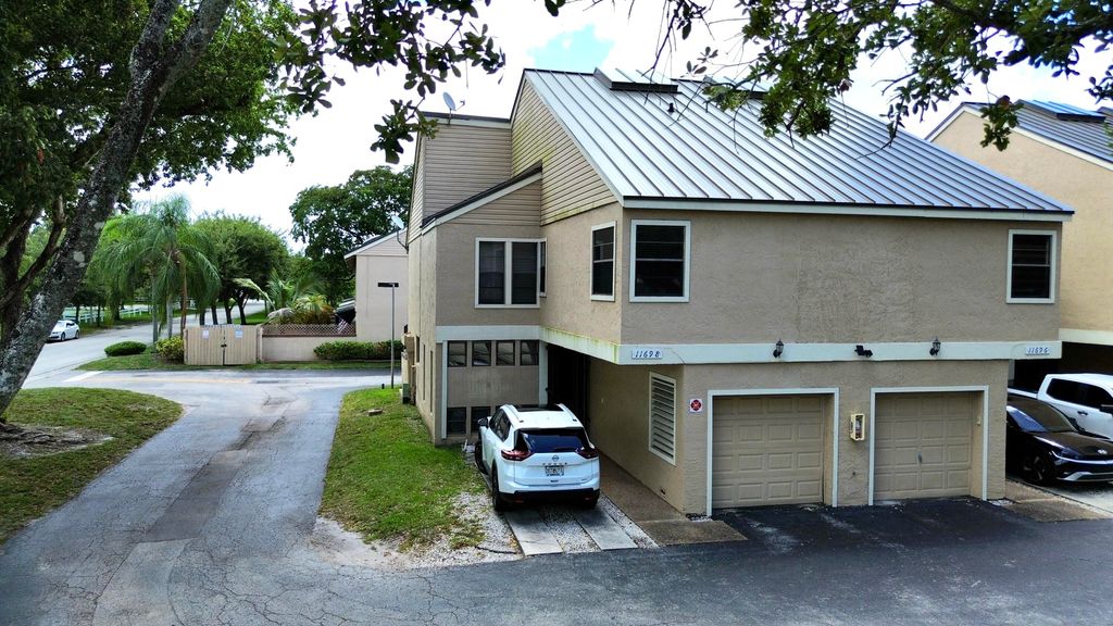 Photo of 11698 NW 20th Drive, Coral Springs, FL 33071 (MLS # B26033429)