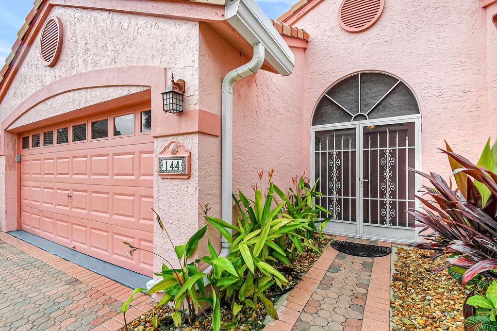 Photo of 144 Egret Circle, Greenacres, FL 33413 (MLS # R11056029)