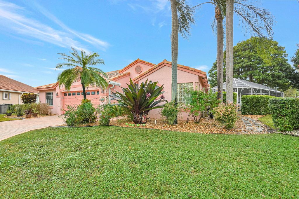 Photo of 144 Egret Circle, Greenacres, FL 33413 (MLS # R11056029)
