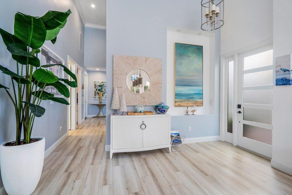 Photo of 302 Alicante Drive, Juno Beach, FL 33408 (MLS # R11012084)