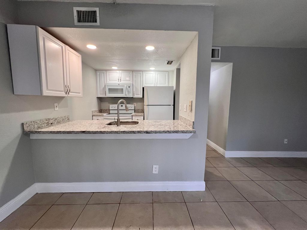 Photo of 6041 N 10th Avenue N #126, Greenacres, FL 33463 (MLS # R11021037)