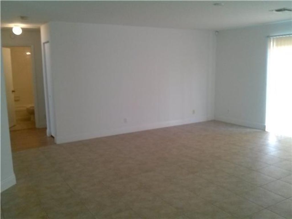 Photo of 300 NW Hibiscus Street, Port Saint Lucie, FL 34983 (MLS # R11005590)